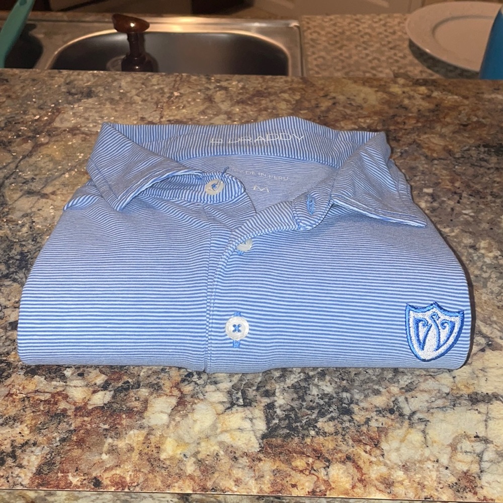 BDraddy golf polo, size medium, color blue with white stripes.
